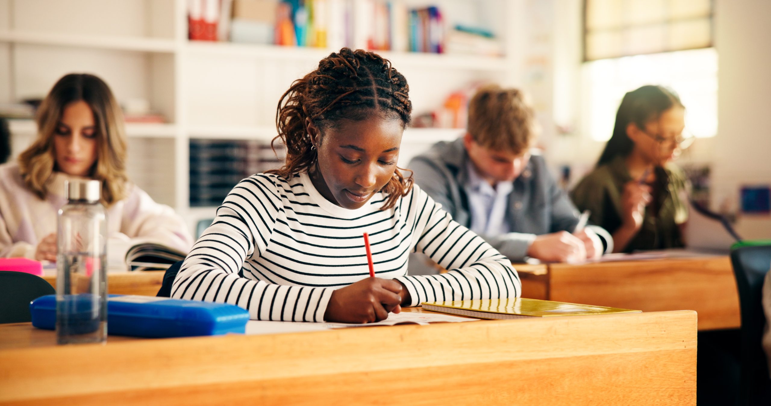 high-school-students-girl-writing-paper-exam-assessment-quiz-evaluation-learning-teenager-education-group-with-aptitude-test-classroom-scholarship-essay-development